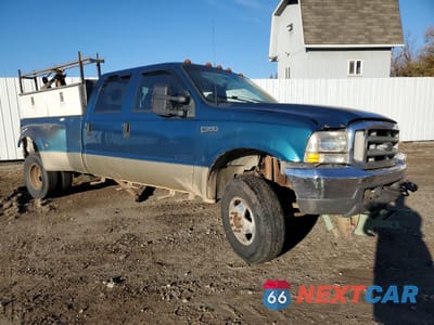 Czwarte zdjęcie samochodu z boku: 2000 FORD F350 SUPER DUTY VIN:1FTWW33F0YEB26836 - miniatura