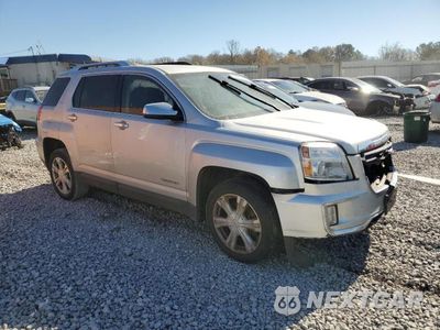 Czwarte zdjęcie samochodu z boku: 2016 GMC TERRAIN SLT VIN:2GKFLPE35G6123392 - miniatura