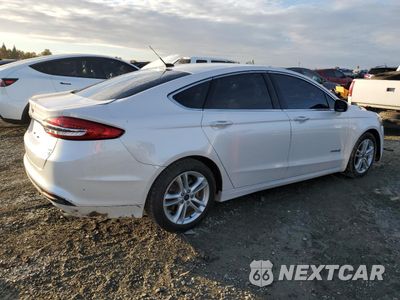 Trzecie zdjęcie samochodu z tyłu: 2018 FORD FUSION SE HYBRID VIN:3FA6P0LU9JR133898 - miniatura