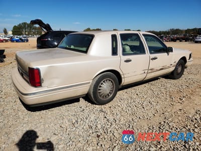 Trzecie zdjęcie samochodu z tyłu: 1996 LINCOLN TOWN CAR CARTIER VIN:1LNLM83W6TY635368 - miniatura