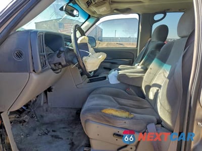 Zdjęcie 7 z 13 samochodu: 2003 GMC YUKON VIN:1GKEC13Z23J284733 - miniatura