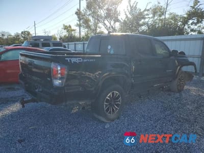 Trzecie zdjęcie samochodu z tyłu: 2020 TOYOTA TACOMA VIN:3TMAZ5CN3LM125798 - miniatura