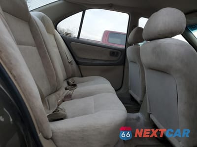 Zdjęcie 10 z 12 samochodu: 1999 NISSAN ALTIMA XE VIN:1N4DL01D0XC143734 - miniatura