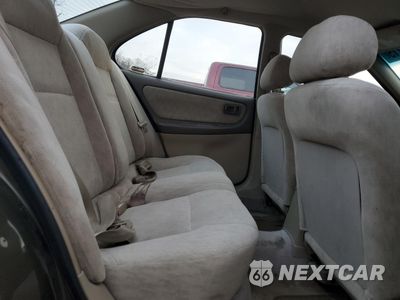 Zdjęcie 10 z 12 samochodu: 1999 NISSAN ALTIMA XE VIN:1N4DL01D0XC143734 - miniatura