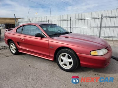 Czwarte zdjęcie samochodu z boku: 1997 FORD MUSTANG GT VIN:1FALP42X1VF129935 - miniatura
