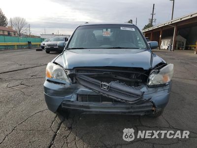 Piąte zdjęcie samochodu w środku: 2005 HONDA PILOT EX VIN:5FNYF18455B055423 - miniatura