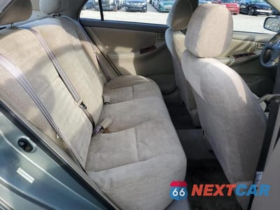 Zdjęcie 10 z 11 samochodu: 2003 TOYOTA COROLLA CE VIN:2T1BR32E13C125673 - miniatura