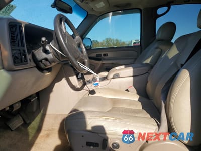 Zdjęcie 7 z 13 samochodu: 2003 GMC YUKON VIN:1GKEC13Z53R184983 - miniatura