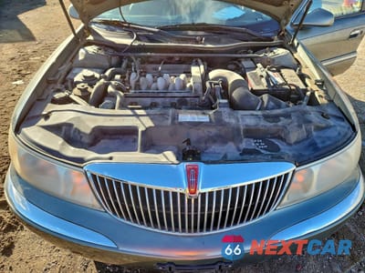 Zdjęcie 11 z 14 samochodu: 2000 LINCOLN CONTINENTAL VIN:1LNHM97V8YY892407 - miniatura