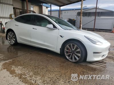 Czwarte zdjęcie samochodu z boku: 2019 TESLA MODEL 3 VIN:5YJ3E1EB8KF440289 - miniatura