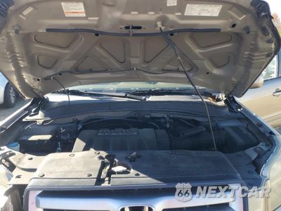 Zdjęcie 12 z 13 samochodu: 2007 HONDA PILOT EX VIN:2HKYF18467H529254 - miniatura