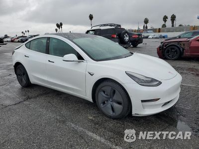 Czwarte zdjęcie samochodu z boku: 2020 TESLA MODEL 3 VIN:5YJ3E1EB1LF711291 - miniatura