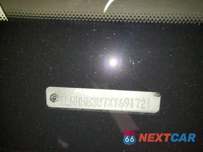 Zdjęcie 14 z 14 samochodu: 1999 LINCOLN TOWN CAR CARTIER VIN:1LNHM83W7XY691721 - miniatura