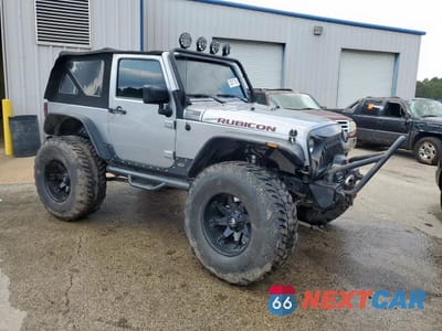 Czwarte zdjęcie samochodu z boku: 2015 JEEP WRANGLER RUBICON VIN:1C4BJWCG4FL625977 - miniatura