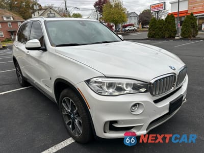 Czwarte zdjęcie samochodu z boku: 2018 BMW X5 XDR40E VIN:5UXKT0C59J0W00863 - miniatura