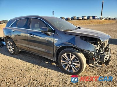Czwarte zdjęcie samochodu z boku: 2020 CADILLAC XT5 PLATINUM PREMIUM LUXURY VIN:1GYKNFRS0LZ117010 - miniatura