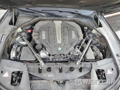 Zdjęcie 12 z 14 samochodu: 2014 BMW 750 I VIN:WBAYA8C55ED825308 - miniatura