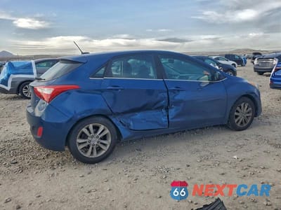 Trzecie zdjęcie samochodu z tyłu: 2014 HYUNDAI ELANTRA GT BASE VIN:KMHD35LH0EU166280 - miniatura
