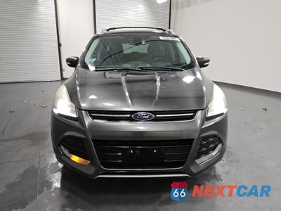 Piąte zdjęcie samochodu w środku: 2016 FORD ESCAPE TITANIUM VIN:1FMCU9J93GUB85405 - miniatura
