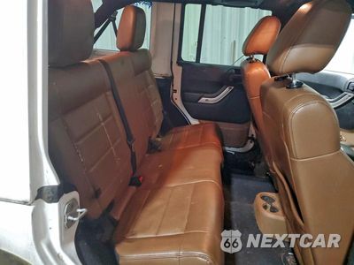 Zdjęcie 11 z 14 samochodu: 2012 JEEP WRANGLER UNLIMITED SAHARA VIN:1C4BJWEG9CL177518 - miniatura