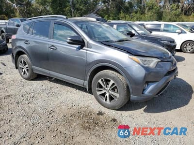 Czwarte zdjęcie samochodu z boku: 2017 TOYOTA RAV4 XLE VIN:JTMRFREV0HD217759 - miniatura