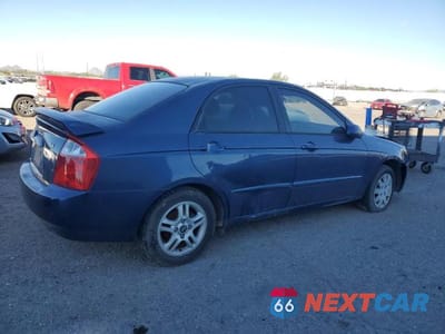 Trzecie zdjęcie samochodu z tyłu: 2004 KIA SPECTRA LX VIN:KNAFE122745052456 - miniatura
