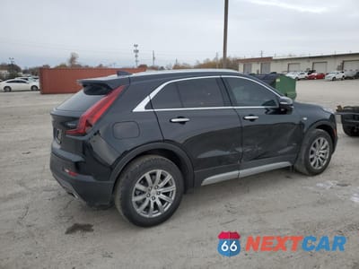 Trzecie zdjęcie samochodu z tyłu: 2023 CADILLAC XT4 PREMIUM LUXURY VIN:1GYFZCR49PF126494 - miniatura