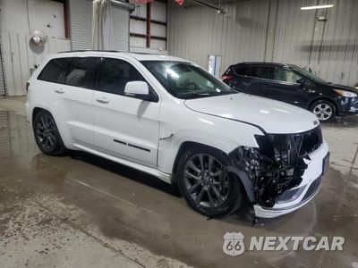 Czwarte zdjęcie samochodu z boku: 2018 JEEP GRAND CHEROKEE OVERLAND VIN:1C4RJFCG4JC483802 - miniatura