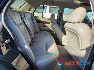 Zdjęcie 10 z 13 samochodu: 2003 MERCURY GRAND MARQUIS LS VIN:2MEFM75W43X641516 - miniatura