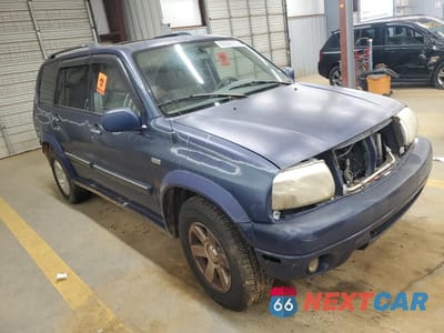 Czwarte zdjęcie samochodu z boku: 2001 SUZUKI GRAND VITARA XL7 TOURING VIN:JS3TX92V814110571 - miniatura