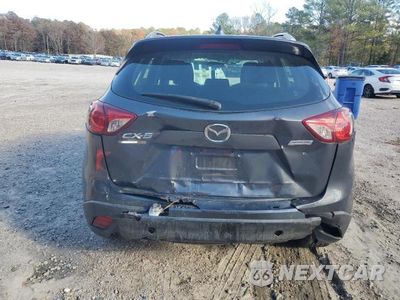 Zdjęcie 6 z 12 samochodu: 2014 MAZDA CX-5 SPORT VIN:JM3KE2BE5E0301456 - miniatura