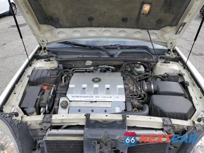 Zdjęcie 11 z 14 samochodu: 2000 CADILLAC DEVILLE DTS VIN:1G6KF5795YU224641 - miniatura