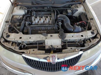 Zdjęcie 11 z 14 samochodu: 2002 LINCOLN CONTINENTAL VIN:1LNHM97V12Y690290 - miniatura