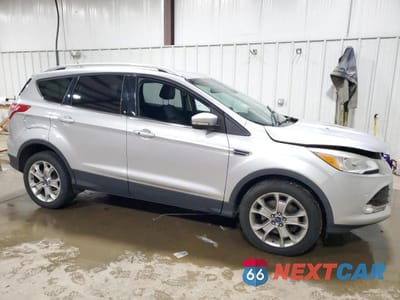 Czwarte zdjęcie samochodu z boku: 2014 FORD ESCAPE TITANIUM VIN:1FMCU9JX4EUC18696 - miniatura