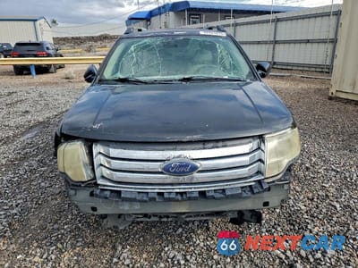 Piąte zdjęcie samochodu w środku: 2009 FORD TAURUS X SEL VIN:1FMDK02W29GA03382 - miniatura