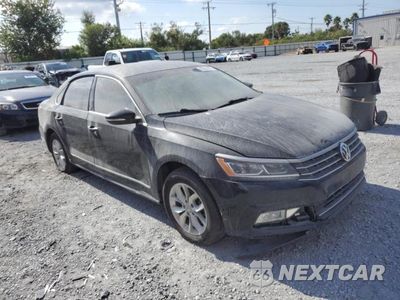 Czwarte zdjęcie samochodu z boku: 2016 VOLKSWAGEN PASSAT S VIN:1VWAT7A35GC043803 - miniatura
