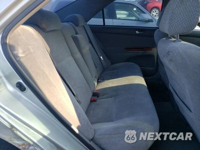 Zdjęcie 10 z 12 samochodu: 2003 TOYOTA CAMRY LE VIN:4T1BE30K13U751999 - miniatura