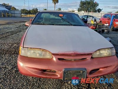 Piąte zdjęcie samochodu w środku: 1995 FORD THUNDERBIRD LX VIN:1FALP62W7SH202406 - miniatura