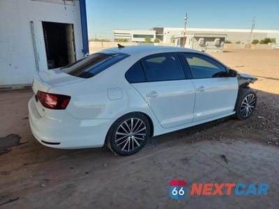 Trzecie zdjęcie samochodu z tyłu: 2016 VOLKSWAGEN JETTA SPORT VIN:3VWD17AJ3GM278264 - miniatura