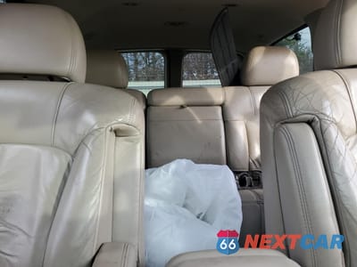 Zdjęcie 10 z 14 samochodu: 2001 CHEVROLET TAHOE K1500 VIN:1GNEK13T31J256843 - miniatura