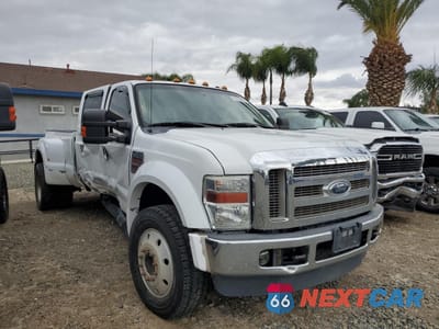 Czwarte zdjęcie samochodu z boku: 2010 FORD F450 SUPER DUTY VIN:1FTXW4DR8AEA22216 - miniatura
