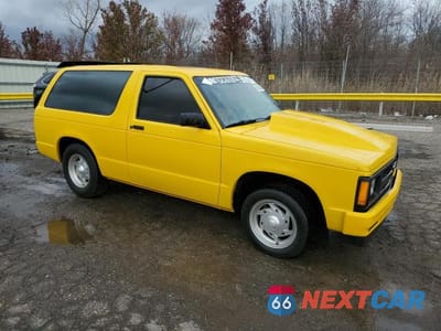 Czwarte zdjęcie samochodu z boku: 1990 CHEVROLET BLAZER S10 VIN:1GNCS18ZXL8126234 - miniatura
