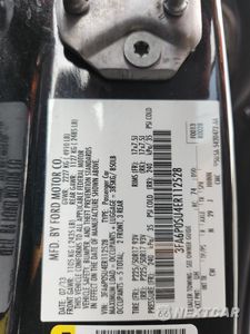 Zdjęcie 12 z 14 samochodu: 2014 FORD FUSION TITANIUM PHEV VIN:3FA6P0SU4ER112528 - miniatura