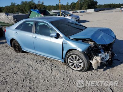 Czwarte zdjęcie samochodu z boku: 2012 TOYOTA CAMRY HYBRID VIN:4T1BD1FK4CU025794 - miniatura