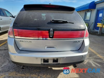 Zdjęcie 6 z 14 samochodu: 2010 LINCOLN MKX VIN:2LMDJ6JC3ABJ18098 - miniatura