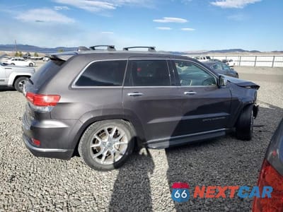 Trzecie zdjęcie samochodu z tyłu: 2015 JEEP GRAND CHEROKEE SUMMIT VIN:1C4RJFJM1FC804274 - miniatura