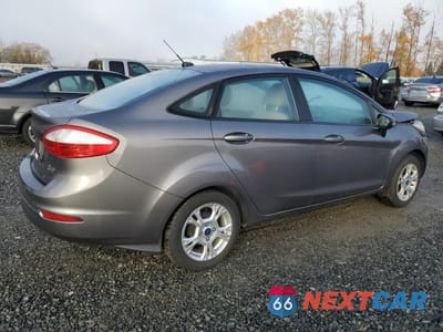 Trzecie zdjęcie samochodu z tyłu: 2014 FORD FIESTA VIN:3FADP4BJ3EM194995 - miniatura