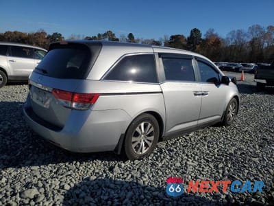 Trzecie zdjęcie samochodu z tyłu: 2016 HONDA ODYSSEY EXL VIN:5FNRL5H68GB095262 - miniatura