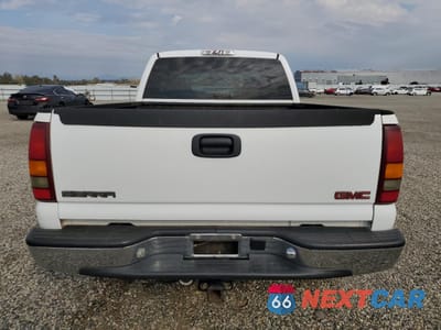 Zdjęcie 6 z 15 samochodu: 2001 GMC NEW SIERRA K1500 VIN:1GTEK19T11E190222 - miniatura