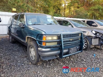 Czwarte zdjęcie samochodu z boku: 1992 CHEVROLET SUBURBAN K1500 VIN:1GNFK16K9NJ338993 - miniatura